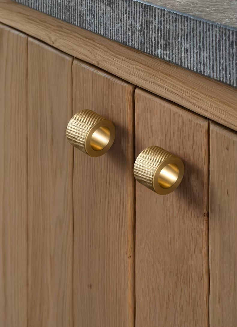 Modern contemporary textured kitchen cabinet round knob satin brass