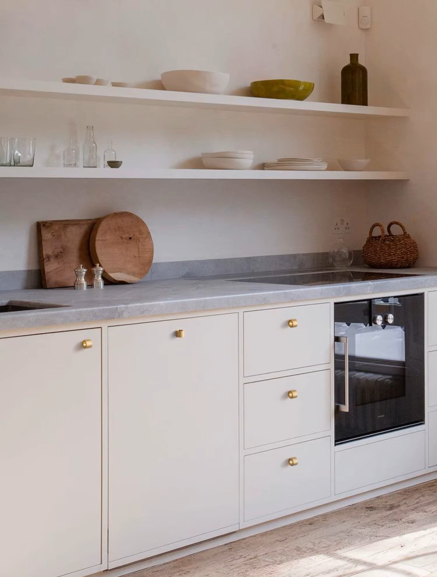 Modern contemporary textured kitchen cabinet round knob satin brass