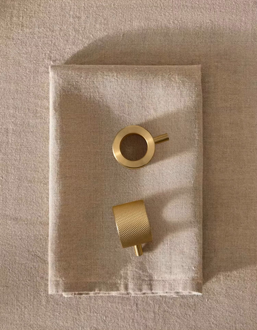 Modern contemporary textured kitchen cabinet round knob satin brass